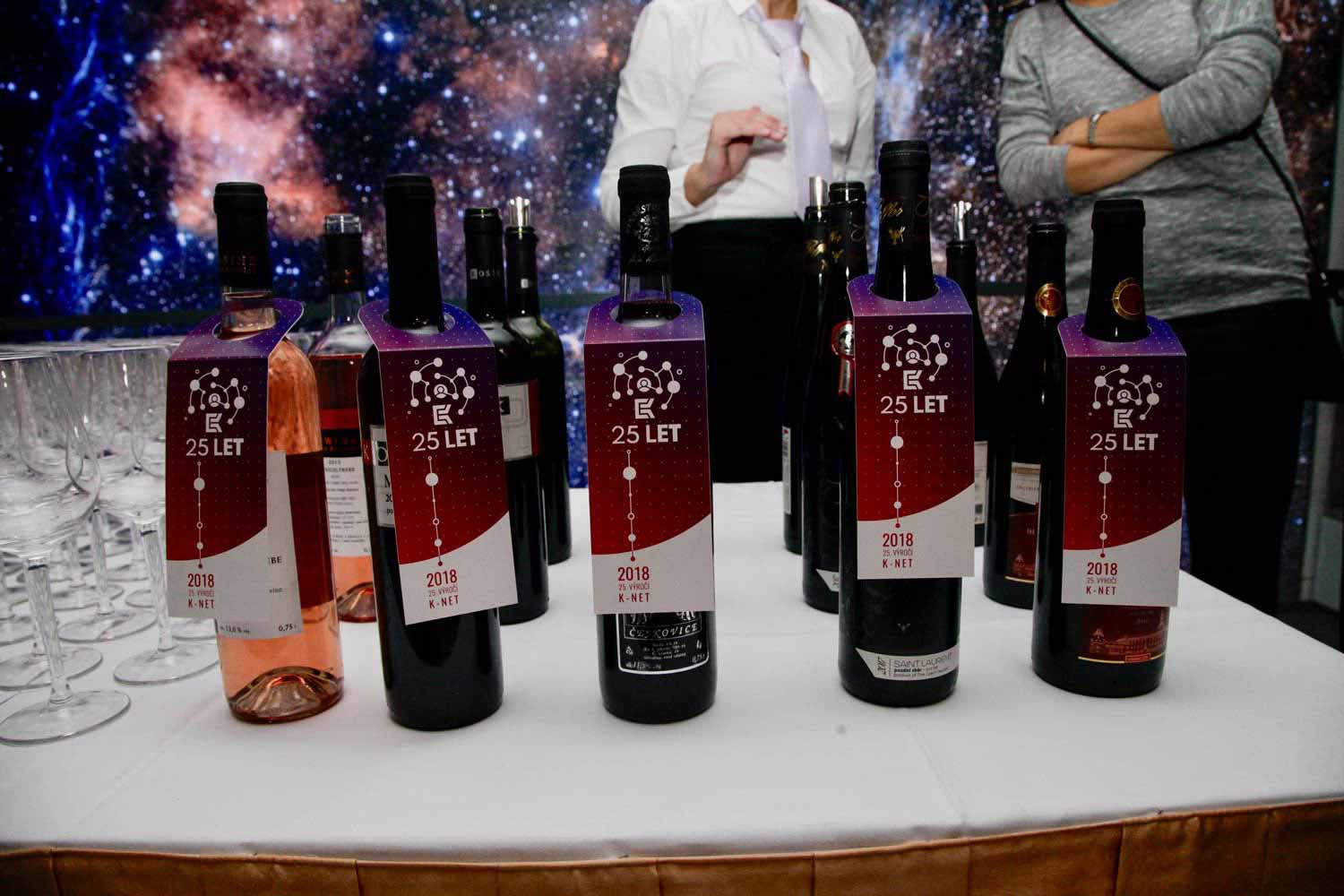 Bootles of wine with K-net logo in Planetarium of Brno