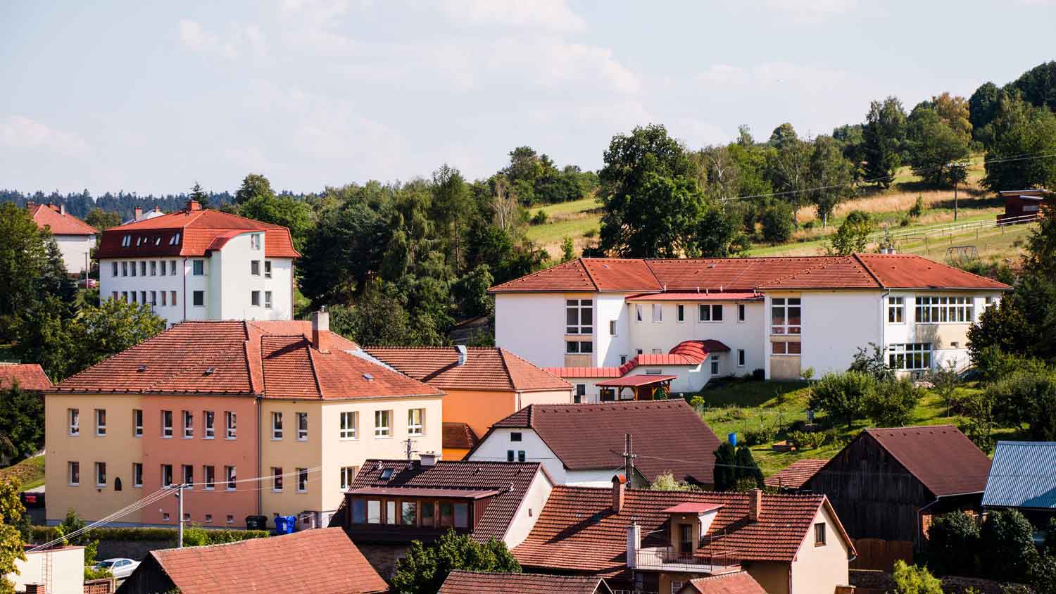 View of the building of the school Strazek on the hill