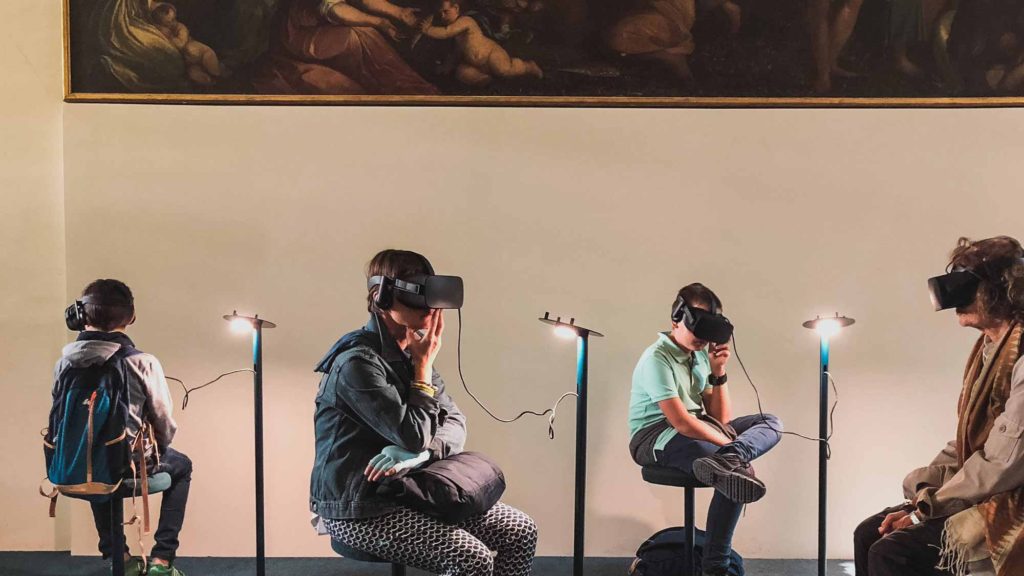 People visiting museum through AR glasses